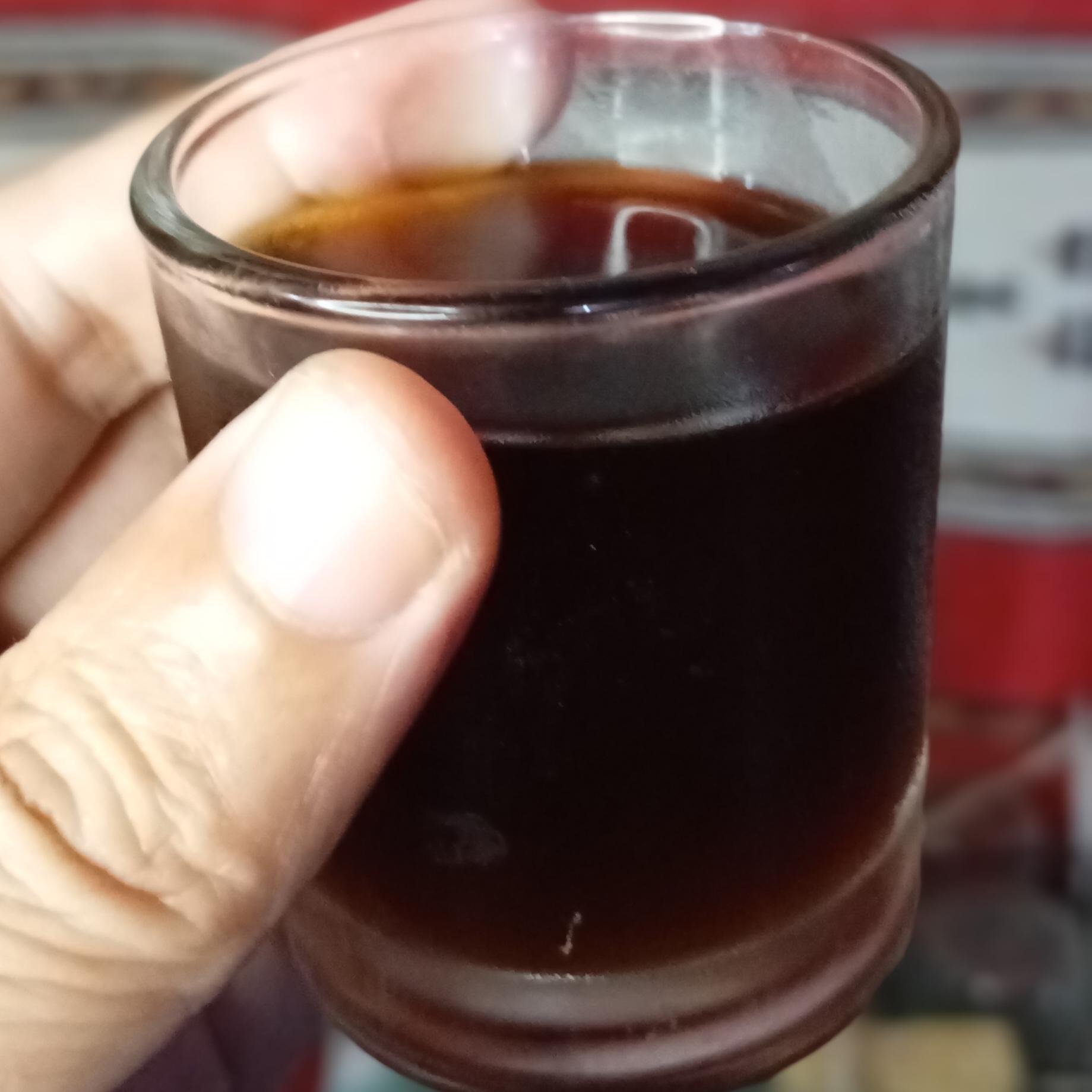 A mini glass of coldbrew coffee